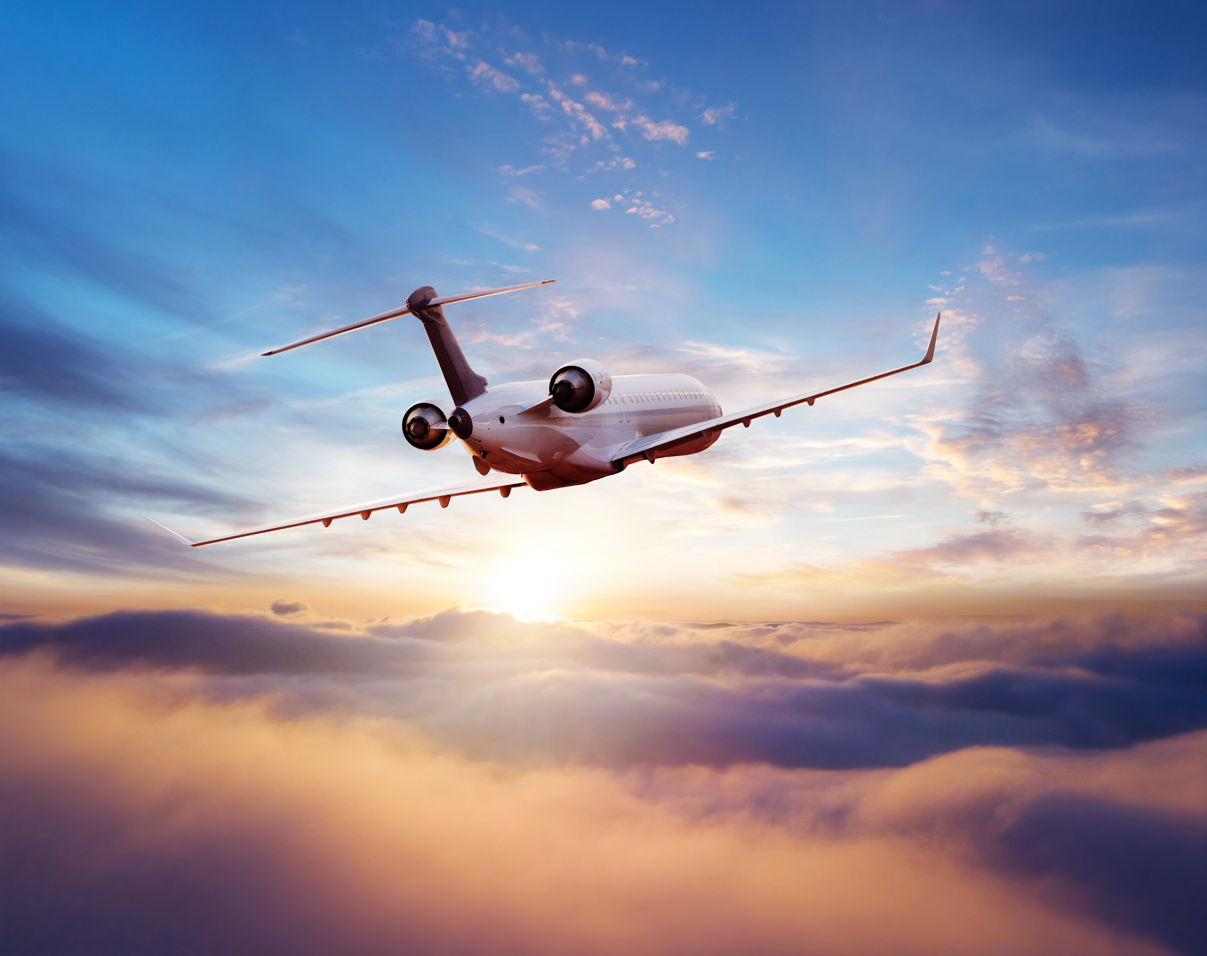 Private Jet Plane Flying in Sunset